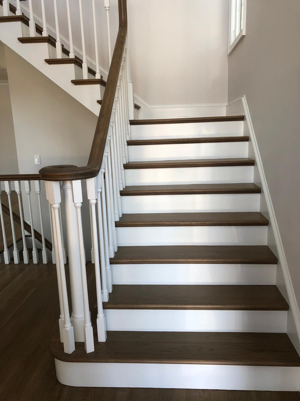 Custom hardwood staircase with white risers